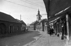 Magyarország, Budapest XXII., Nagytétényi út (Vörös Hadsereg útja) a Szentháromság (Nagytétényi Szőlő) tér és Szabadság utca között. Szemben a Nagyboldogasszony-templom., 1960, UVATERV, utcakép, Budapest, Fortepan #92060