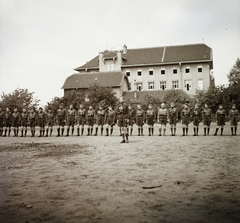 Hungary, Budapest XI., Villányi út 27., a Budai Ciszterci Szent Imre Gimnázium sportpályája, háttérben a szomszédos Kertészeti Akadémia épülete (később Szent István Egyetem, majd Magyar Agrár- és Élettudományi Egyetem, Budai Campus)., 1939, Ebner, school, uniform, kids, scouting, shorts, knee snocks, Budapest, Fortepan #92371