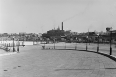 Magyarország, Népstadion, Budapest XIV., kocsifeljáró a Keleti pályaudvar felőli oldalon a felső tribünök alá, háttérben a Kerepesi úti Szent Teréz templom tornya látszik., 1960, UVATERV, sport, lámpaoszlop, Budapest, Fortepan #9279