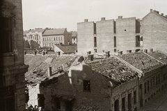 Hungary, Budapest VIII., az előtérben a Szigetvári utca páratlan oldalának romos házai, a háttérben balra a Magdolna utca házai látszanak., 1944, Misányi Olivér, war damage, bombing, damaged building, Budapest, Fortepan #93776